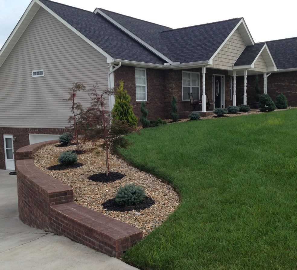 Home with new siding and brick accents
